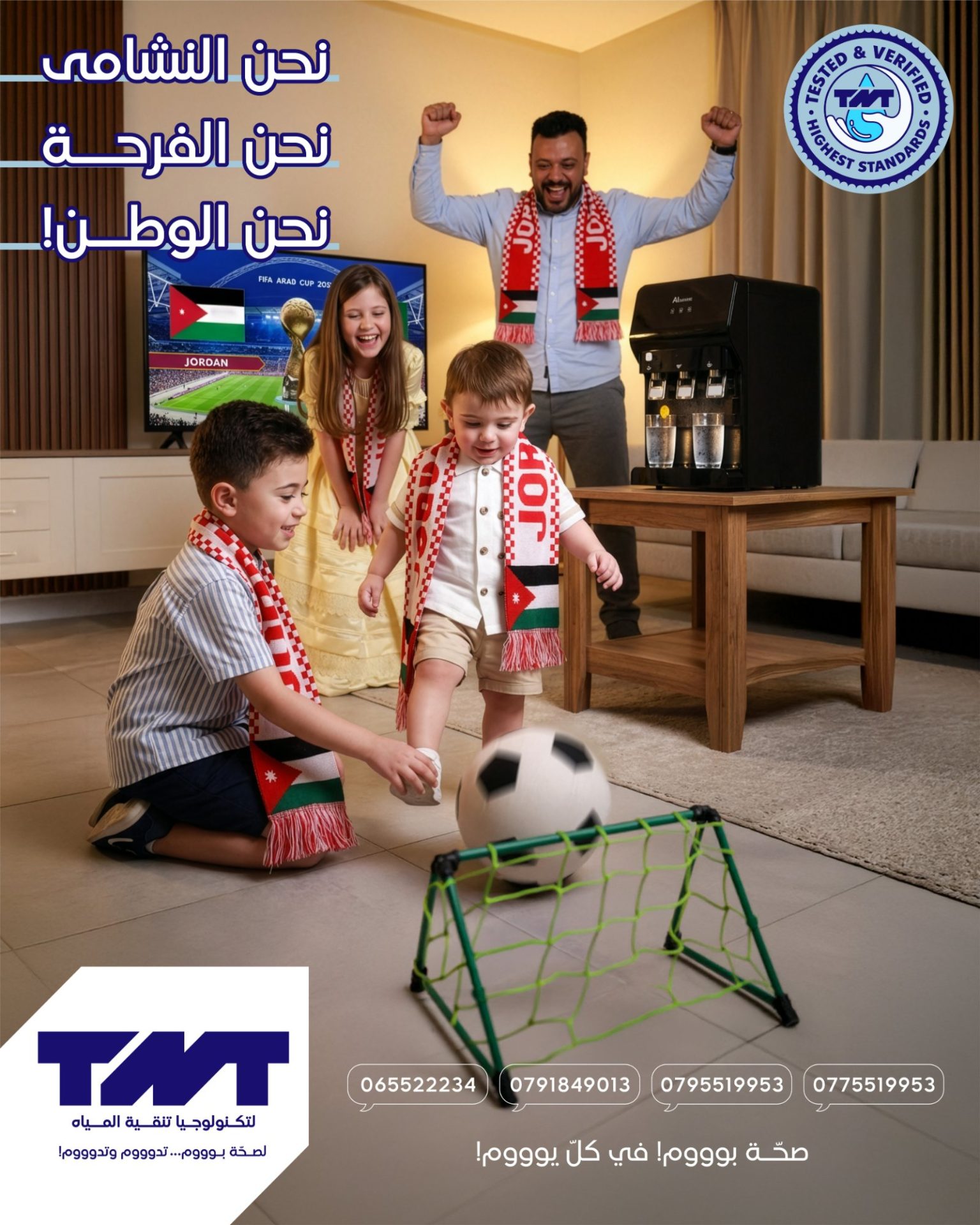 We are the Nashama, we are the joy, we are the nation! The family celebrates the Nashama, with a TNT countertop cooler beside them serving cold, pure water.